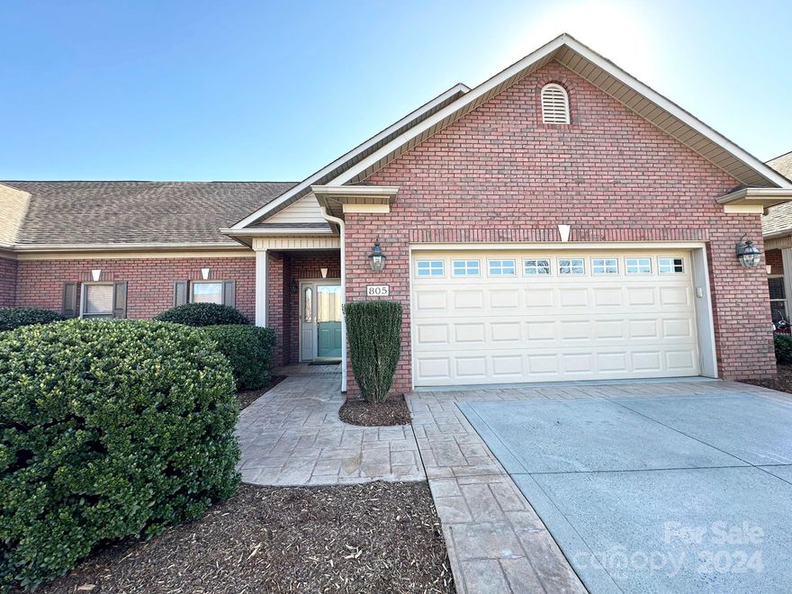 Nestled in a vibrant neighborhood...This meticulously maintained one-owner unit is not just a home, it's a lifestyle waiting for you to embrace. Step inside to discover an open floor plan that seamlessly connects the living spaces, creating an inviting atmosphere perfect for entertaining or relaxing. Spacious LR has a gas-log fireplace & vaulted ceiling; a dedicated Dining complemented by the large Kitchen offering solid-surface counters, breakfast bar & ample cabinets. The Sunroom provides a tranquil spot to unwind after a long day. Split-BR plan offers a primary BR w/ walk-in closet & en-suite BA equipped w/ a double vanity, jetted tub, separate shower. The secondary BR ideally positioned for flexibility as a guest room or home office. Highlights include under-cabinet lighting, laminate & tile flooring (no carpet), large laundry room complete w/ mud sink, floored attic has added insulation for extra storage & an over-sized garage. Quaint patio w/ awning for shaded outdoor enjoyment.