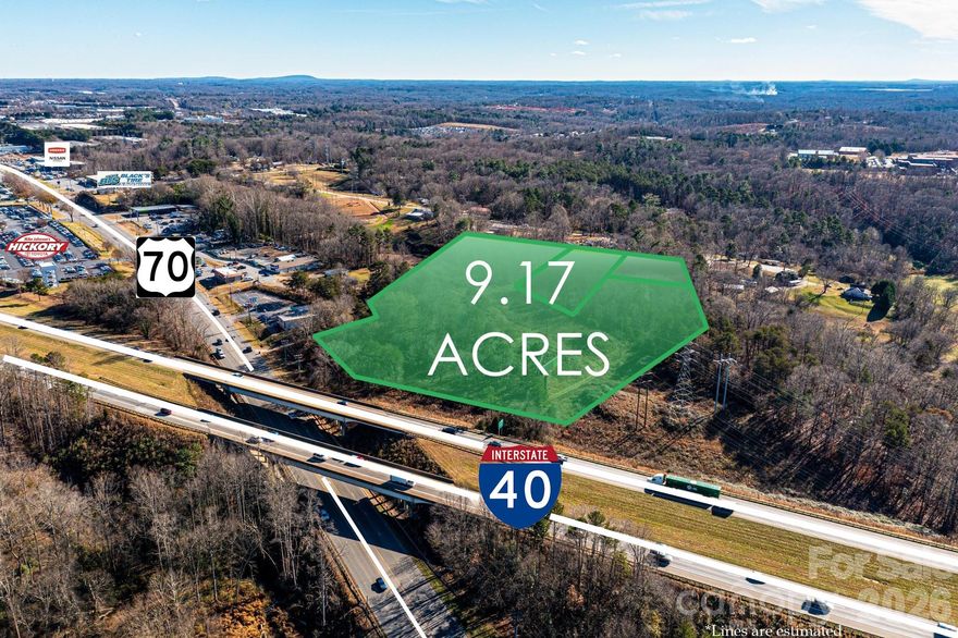 LOOKING FOR VISIBILITY?? This 9.17 Acres fronts I-40 and Hwy 70 in Hickory's commercial district, and is located among many major automotive dealership locations, including Toyota, Honda, Nissan, Kia, Hyundai, Ford and more! Offering 375 feet fronting I-40 and coming with billboard revenue on site! NCDOT Average traffic counts of over 85,000 vehicles per day combined between I-40 and Hwy 70!! Land does have a 1966 ranch home that is being rented, of no value consideration. Also listed as Land, MLS 4333547.