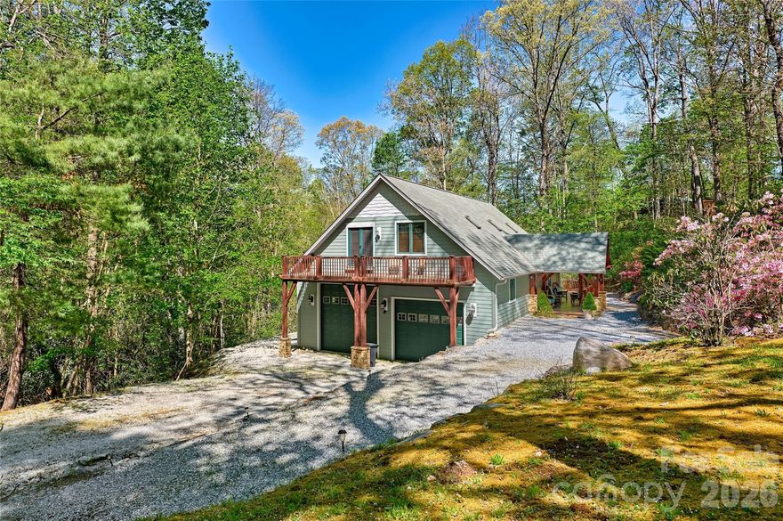 Come see this 2-bed 2-bath home conveniently located between Cashiers, Brevard, and Gorges State Park. This property offers easy access to some of the area’s most sought-after destinations. Ideal as a primary residence, mountain getaway, or investment opportunity. The home is suitable for short-term rentals. The lower-level garage was specifically built to accommodate a 40-foot motor coach, providing exceptional space for RV storage along with ample additional garage capacity. The home also features generous deck space with awnings, perfect for enjoying the outdoors in comfort and entertaining during warmer months.
