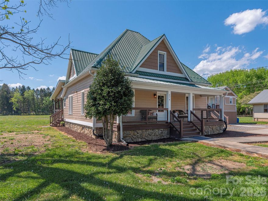 Step into the charm of this beautifully remodeled 1899 farmhouse, where timeless character meets modern convenience. A welcoming front porch invites you in, leading to a spacious interior with soaring 9.5-foot ceilings and wide plank commercial-grade vinyl flooring. The main level features two bedrooms and a full bath, along with a warm, inviting country kitchen and formal dining and living room perfect for gathering. Upstairs offers two additional bedrooms and another full bath, providing flexible living space for family, guests, or work-from-home needs. A convenient mudroom includes a half bath and laundry area. Major updates bring peace of mind, including new wiring and plumbing, open-cell foam insulation, LP Smart Siding, and an 8-year-old metal roof. Comfort is ensured year-round with a natural gas furnace and A/C on the main level, plus a heat pump upstairs. A Navien tankless water heater adds efficiency. Enjoy outdoor living on the oversized covered back deck, complete with an outdoor sink—ideal for entertaining or relaxing. Full RV/Motorhome Hookup. Located in Clyde’s C-2 Commercial district, this versatile property could be a residence, office, or event venue, offering endless possibilities. Updated, move in ready and rich with history!