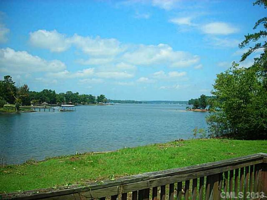 Fantastic main channel view from this premium waterfront property on Lake Wylie.  Build your custom lake home on this super level 0.9 acre lot with exceptional views.  Excellent area of Lake Wylie, no HOA fees.  Clover schools!  Dock in place, 235' shoreline. See tour.