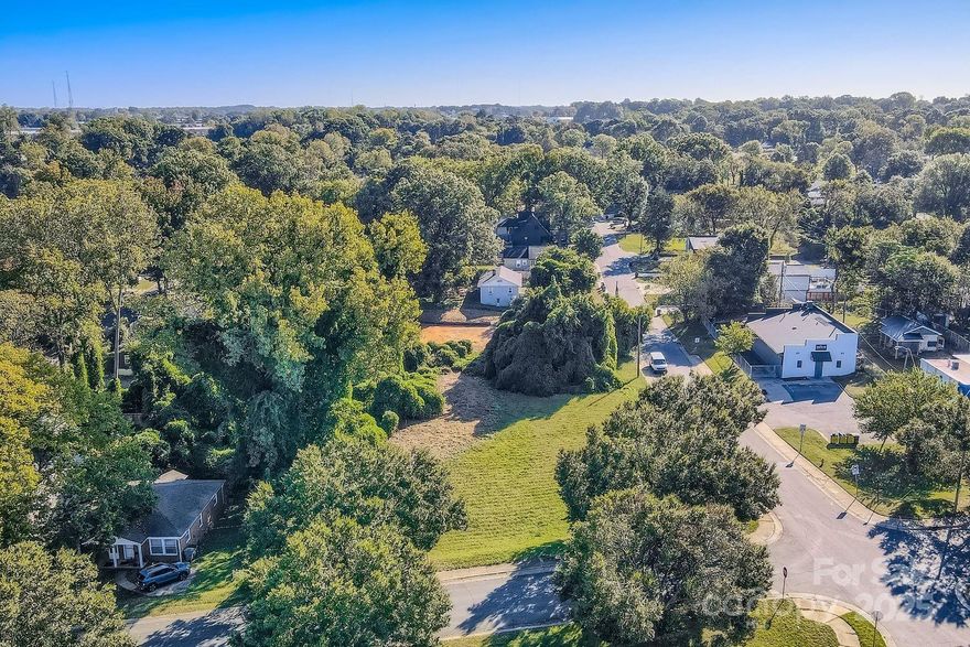 Exceptional opportunity to invest in a lot or build on a lot in a high growth area of Charlotte!  The location of this lot has countless amenities.  The lot is within minutes of Uptown Charlotte, has easy access to several major highways (I-77, I-277, and I-85), and access to public transportation.  The community is experiencing exciting growth, with new construction throughout the area and new townhome development directly across the street! There are several shopping and restaurant options in nearby Camp North End.  Outdoor enthusiasts will love having a community park and garden within a short distance, perfect for relaxation or recreation.  Don't miss out on this great lot!