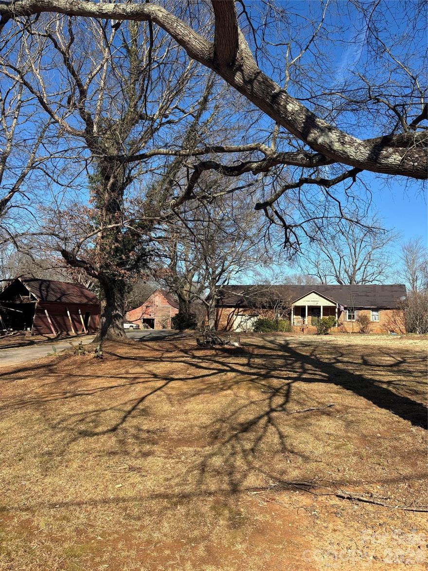 28.77-acre assemblage consisting of three parcels and one residential property being sold, "as-is." Property is currently zoned Residential (R-20) in Union County. Buyer to verify zoning, permitted uses, density, subdivision potential, utility availability, and all development requirements with Union County and applicable authorities. Located approximately two miles from US-74 and less than ten minutes from I-485, with proximity to existing residential communities and nearby retail, services, and amenities. Water and sewer availability subject to connection through Union County Public Works. Portions of the property include natural water features. No representations or warranties are made regarding future development, rezoning, or approvals. Listing information deemed reliable but not guaranteed.