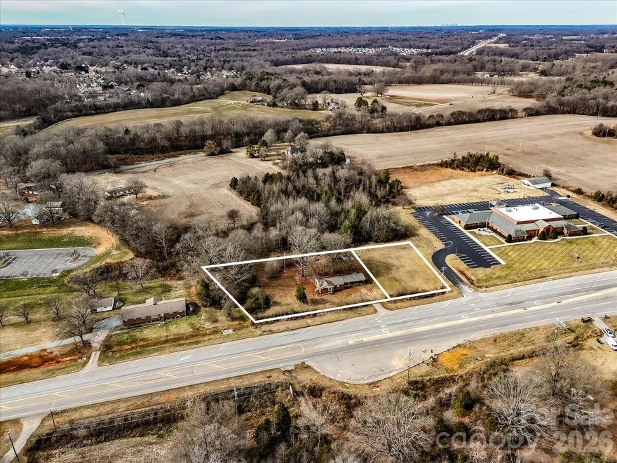 Slightly over one acre on Concord Hwy near the Monroe Bypass exit! Two parcels included.  Zoned commercial,  Regional Corridor Mixed Use.  Good road frontage and multiple uses for this convenient, high traffic location!

 For specific uses, please check out at this site:

https://www.monroenc.org/DocumentCenter/View/1789/Unified-Development-Ordinance-PDF?bidId=
Table of Uses is 7.1. Scroll through RCMX to see the many uses for this parcel.