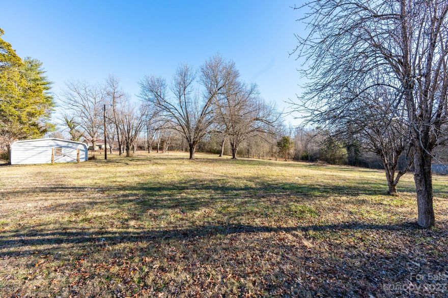 Check out this amazing 4.20 acre property with a multitude of possible uses in the Town of Long View. Access is right off Cape Hickory road and it has water and sewer meters installed on the property. There is a large metal carport and a concrete block garage building with power on the property. This would be a great property for someone that wanted to build their dream home and not worry about the restrictions of a neighborhood. This property could also possibly be subdivided into separate lots. The seller recently had most of the wooded areas cleared so buyers can really see what this property has to offer. There is a locked gate to access this property so no viewings allowed without an agent present. There are very few properties like this on the market right now so hurry up and check it out before it is gone.