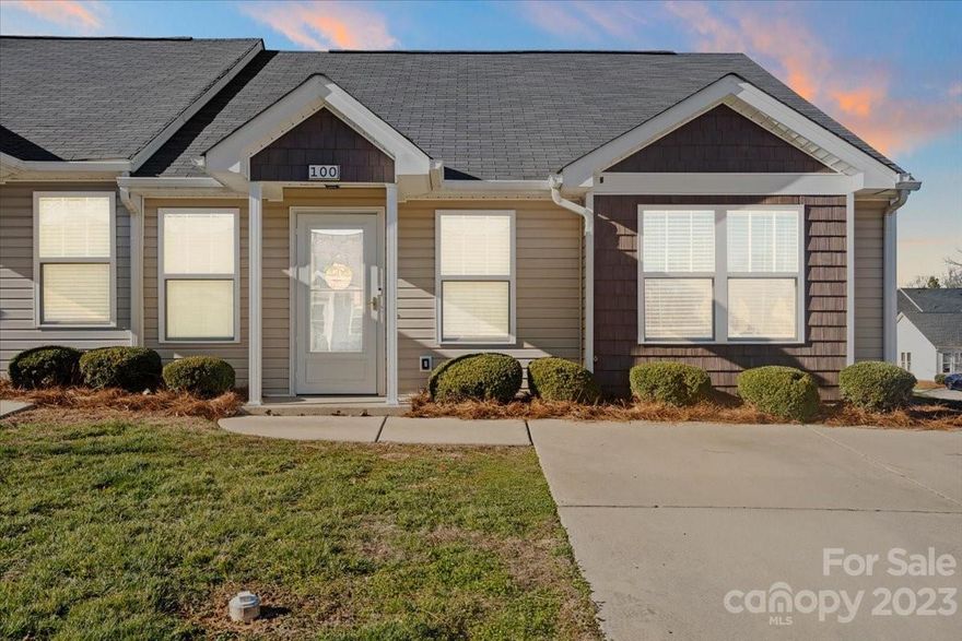 Welcome to this charming, cottage-style townhome in the serene Mountain Island Village neighborhood. This beautiful end unit, with its rich laminate flooring and vaulted ceilings, offers a bright and inviting living space. It boasts two spacious bedrooms and a variety of modern amenities. The highlight is the newly remodeled primary bathroom, complete with contemporary fixtures and finishes. Outside, the fenced back patio provides a private oasis for entertaining, grilling, or simply relaxing. The townhome is also conveniently near the airport and a short drive from the historic downtown Mt. Holly, known for its unique charm, delightful restaurants, and boutique shopping. Its prime location offers easy access to highways 16, 85, and 485, making commuting a breeze. Don't miss this opportunity to make this adorable townhome your own!