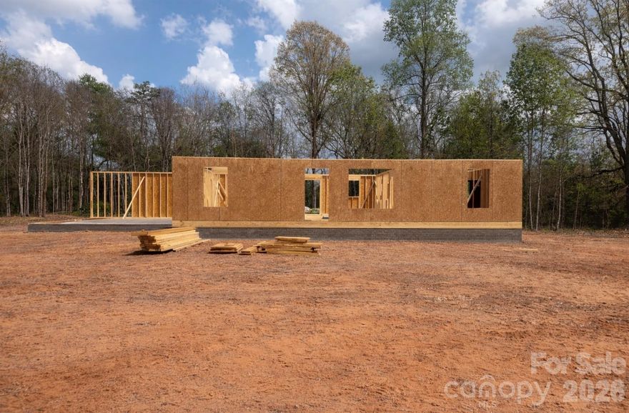 This beautiful future build located at 3014 Polkville Road in Shelby, North Carolina will feature a thoughtfully designed 3-bedroom, 2-bath open floor plan. The home will include a spacious kitchen with island, dedicated laundry/mudroom, and vaulted ceilings in both the living room and primary bedroom, creating a bright and inviting atmosphere throughout.Additional features include a fully encapsulated crawl space, providing added efficiency and peace of mind.
The home is expected to offer approximately 1,426 square feet, with final square footage to be determined. Listing is anticipated to go live on April 7th, with an estimated completion date of July 2026 (subject to change).