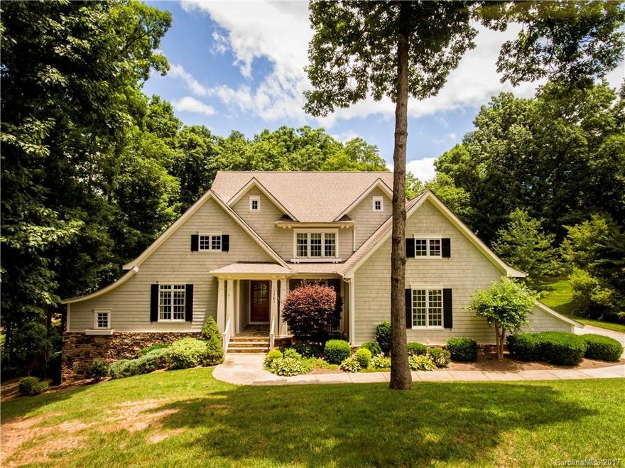 BELOW TAX VALUE. Gorgeous golf course Cape Cod with water view in The Point. MASTER SUITE ON MAIN with cathedral ceiling. Chef's kitchen- ss appliances and craftsman cabinets.  Breakfast area with banquette seating. Beamed ceiling and wall of windows in FR to enjoy the views. GUEST SUITE ON MAIN. Upstairs beds have own baths. Large bonus area with views from Juliet balcony. Fantastic walk-in attic. DEEDED SLIP around corner. OFFERING 5K TOWARD MEMBERSHIP with acceptable offer.