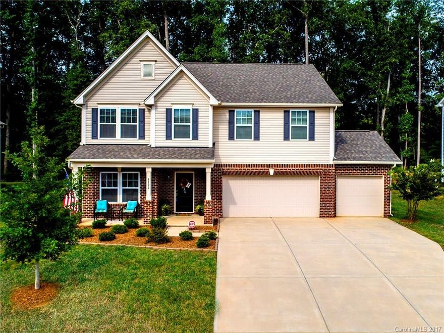 Room to spread out! Gorgeous, well maintained model like home backs up to woods for privacy. Home features 4Beds & 3.5Baths. Hardwoods thru out main level. Large granite island in kitchen & butler's pantry leading to the dining room perfect for entertaining. Master suite w/ dual closest and a separate tub/shower. 3 additional beds & a huge bonus room round out 2nd floor. 3 car garage leading to drop zone. Large paver patio! Short walk to pool. Low SC taxes & award winning schools all for YOU!