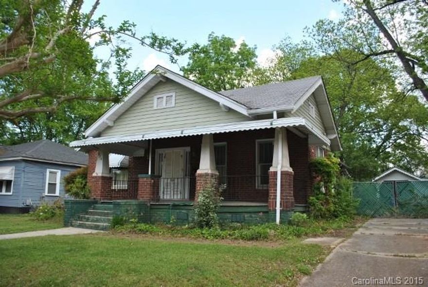 Investment opportunity. Sold as is - price reflects repairs that need to be made. Detached carport, fenced yard. Some hardwood floors. Includes Parcel 011 295, an additional building lot.