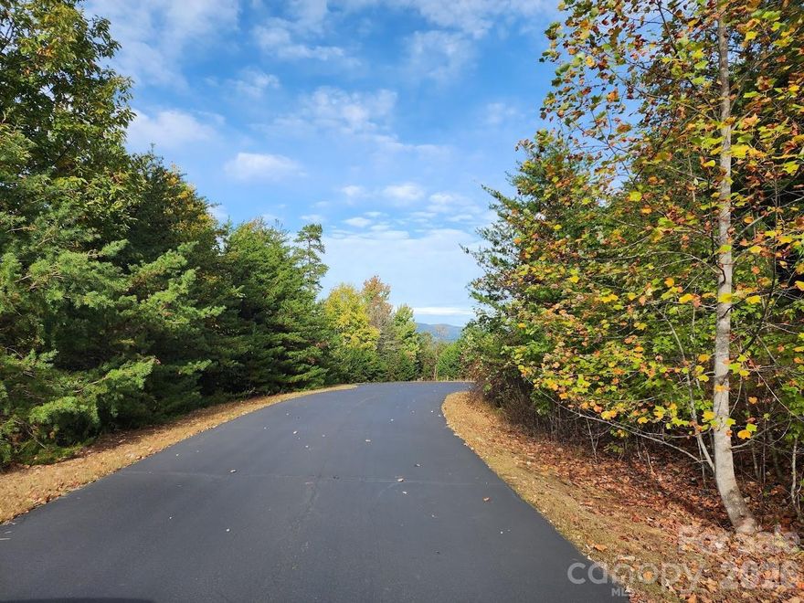 Looking for a peaceful mountain retreat in Western North Carolina? This 6.69-acre homesite in the gated South Mountain Peaks community offers beautiful mountain views and a setting that lays well for building — without the steep, cliffside terrain often found with mountain properties.

Enjoy paved roads, underground utilities, and year-round access, making it easy to build now or hold as a future getaway property.

Located less than 2 miles from Northgate Resort’s popular Jellystone Campground, the area offers fun for visiting family and friends while still providing the quiet privacy of mountain living. Outdoor enthusiasts will appreciate being within sight of the 30,000-acre South Mountain State Park and Gamelands, known for hiking, waterfalls, wildlife, and scenic beauty.

Conveniently situated about halfway between Charlotte and Asheville, with access to I-85, I-26, and I-40, this property makes weekend visits simple and full-time mountain living realistic.

Minimum 1,200 SF site-built home. No mobile or modular homes.

A wonderful opportunity to create your Western North Carolina mountain escape.