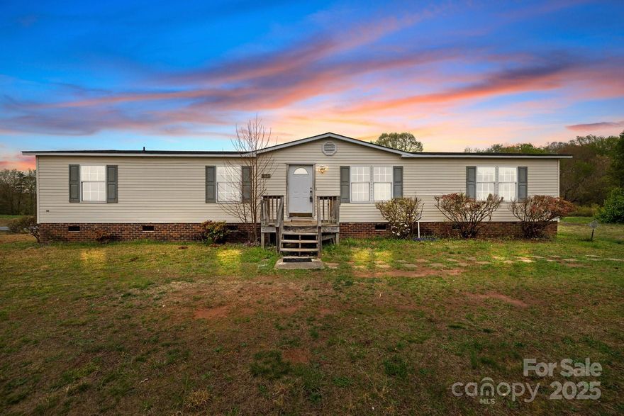 Welcome to this inviting Bessemer City home, perfectly situated on a spacious corner lot. Inside, you'll find open concept living with brand new LVP flooring that adds warmth and style throughout the main living areas. The layout offers both comfort and functionality—ideal for everyday living and easy entertaining. Refreshed bathrooms bring a clean, modern feel, while the overall design creates a sense of privacy and coziness. Whether you're hosting guests or enjoying a quiet evening in, this home strikes the perfect balance of welcoming charm and practicality.