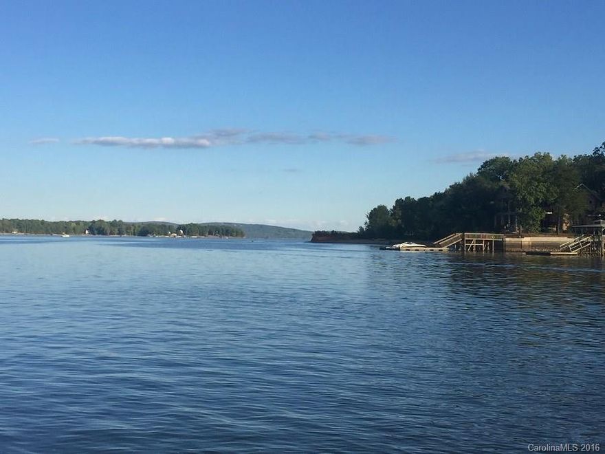 WATERFRONT LOT in SUNSET POINTE at a GREAT PRICE.Come experience living the Lake Life on High Rock Lake,the 2nd largest lake in NC. Build your waterfront dream home in a Gated Community which offers a fully furnished Club House w/work out room,pool,tennis courts, etc..Everything you need right here. Close to main channel of the Lake and restaurants/marina you can dock your boat and enjoy dinner. Priced well below tax value, DON'T MISS THIS OPPORTUNITY.  Shared dock/pier allowed. 5 min. to I-85!