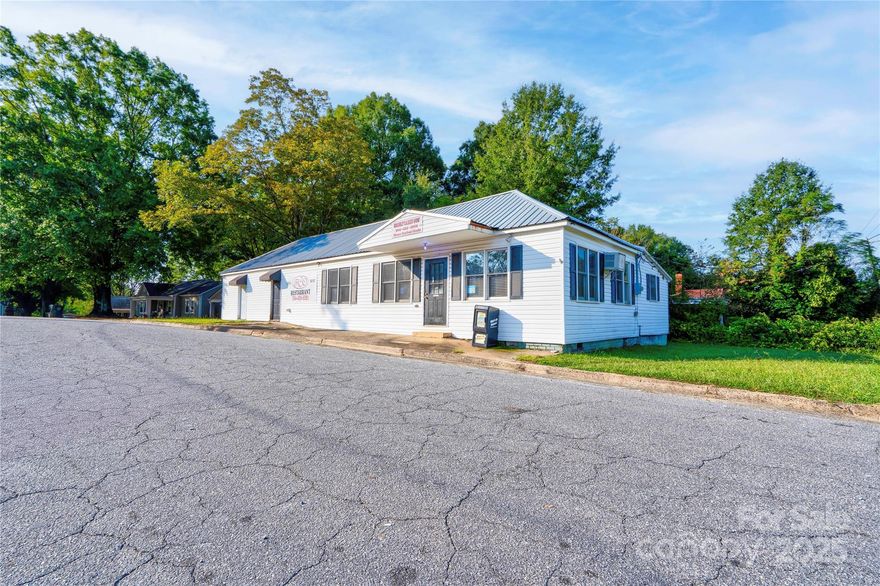 Excellent Commercial Opportunity in Cherryville, NC! Prime corner lot location. Previously operated as a restaurant, this property is equipped with commercial-grade appliances including a grill, fryers, refrigerator, freezer, and more. The dining area features a service counter and booth seating, making it a turnkey option for a new owner. With endless possibilities, this versatile space is ideal for launching your next business in a thriving small-town setting.