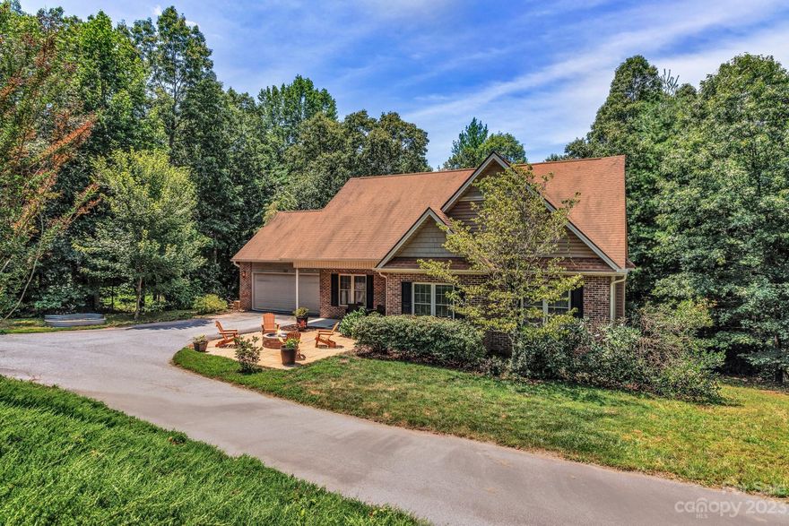 Come explore this beautifully maintained home situated on a cul de sac in a picturesque neighborhood. You will want to sip on your favorite beverage sitting by the fire pit and listening to the sounds of nature. Upon entering the home, you will experience tons of natural light with its vaulted ceilings and open floor plan. There's a formal dining room, a living room upstairs, plus another den/living room downstairs with 12 ft ceilings for all your social gatherings. This lovely home has 3 bedrooms, 3 full baths (jacuzzi in the primary with a separate shower), an office/bonus room, and your very own Scottish Pub!! Just in case you need more space, there's a huge storage area plus a giant workshop for all your hobbies. This home also features a deck plus multiple outdoor areas for all your outdoor activities.  You name it, this home has it. I pulled up to this home and it was like the clouds parted, the sun shone down, and the birds were singing. This is one you won't want to miss!!!!