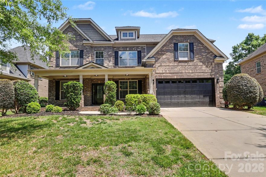 Beautifully updated 5 bedroom, 4 bathroom full brick two-story home in a great school district. Main floor features a home office, dining room, renovated kitchen, great room, sun room, bedroom and full bathroom and a laundry room. The renovated kitchen features quartz countertops and backsplash, updated hardware, faucet and sink, and a gas cooktop.  Upstairs features the primary suite, three bedrooms and a bonus room. The luxurious primary suite includes a freestanding soaking tub, walk-in shower, new tile flooring, quartz countertops, updated fixtures, and a custom closet system. Enjoy seamless indoor/outdoor living with a patio fire pit ideal for relaxing evenings. Smart home technology operates the lights, cameras, speakers, and thermostats, adding convenience and comfort throughout the home.