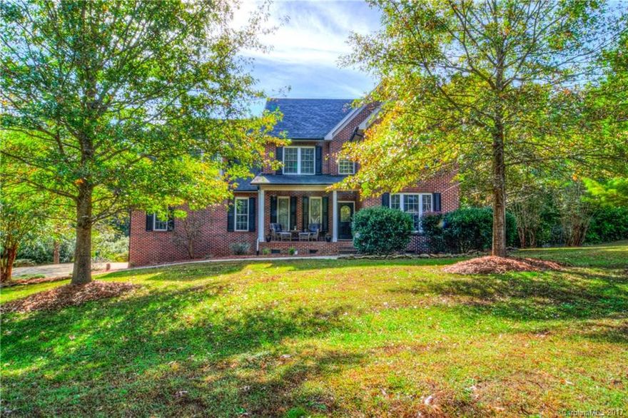 House has over an acre lot and property borders /shared ownership of large pond. Features include a deck overlooking the pond; 4 bedrooms; full brick; all kitchen SS appliances; hardwood floors; office/living room off the front entrance.  Located at end of Cul de Sac with good privacy. Don't miss the garage with lots of storage including a "catwalk" for storage.