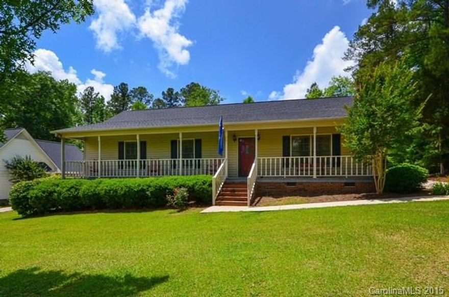 Ranch home with side load 2 car garage, all bedrooms have WIC/MBR has two!  Large bedrooms, flex room off master could be used as a den, office, nursery, exercise room.  Large eat-in kitchen with stainless appliances and designer cabinets.  The stainless microwave will remain.  All new lighting, hardware in kitchen and baths.  Large, almost half acre lot that is wooded on 2 sides.  Great location to shopping!