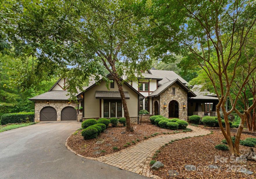 Welcome to this enchanting estate nestled on 11 acres in the Sanctuary where modern luxury meets natures tranquility. Designed for multigenerational living this home offers the ideal blend of privacy & shared spaces that truly embody the essence of sanctuary living. Main level features stunning primary suite w/fireplace seamlessly flowing to flex space enveloped w/windows inviting the serene outdoors inside. Indulge your culinary passions in gourmet kitchen equipped w/top of the line appliances & dumbwaiter to make every cooking experience seamless. Continue the experience in the captivating add'l bedroom, an enchanted forest inspired retreat w/built in bunks, climbing wall, fireman pole & more for the adventurous spirit. The elevator provides seamless access to the second living area below boasting 2 bdr suites, full kitchen & see through fireplace creating the ideal 2nd living space. This estate is a rare fusion of elegance, privacy & comfort-a true masterpiece in the Sanctuary.