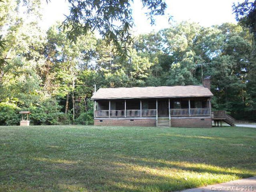 Quaint, adorable and affordable sitting high on the hill shaded by mature trees, this remodeled house awaits its new owner!  Sitting on 5 acres in Fairview area, this house features updates in lighting, faucets, flooring and granite counters! New windows @ 4 yrs old, Roof is 2 years old and HVAC is @ 4 years old. Extra long concrete driveway with parking pad.  Big laundry room with utility sink.  Washer/dryer/refrigerator remain! House sits off of the road and offers privacy on all sides. No carpet in house!