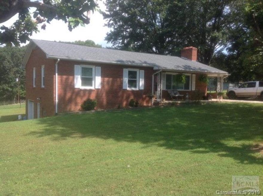 Great opportunity with this 3BR 1.5 bath brick ranch w/full basement, brick fireplace, and many updates including laminate floors, thermal windows, architectural shingle roof and large .77 acre lot with mountain views plus its only minutes to Morganton, Marion or Asheville. This would make a great year round home, weekend getaway. Home also includes a 1 year home buyer warranty.