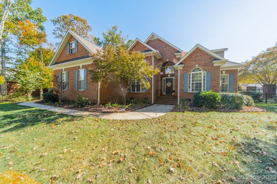 Start making memories in this beautiful 2-story brick home in the heart of highly desirable Shannamara!  Generously sized rooms and an open floorplan greet you as you step inside.  Spacious Great Room with gas fireplace opens to the kitchen and dining area.  Main floor Primary Suite with tray ceiling, sitting area, walk-in closet and light filled bathroom.  2 additional bedrooms on the main floor.  Head upstairs to a 4th bedroom, full bath, and flexible bonus room.  Don't miss the incredible storage and enormous walk in attic space!  Head outside and relax on the inviting  screen porch or by the firepit on the patio on the .47 acre wooded lot.   Conveniently located directly across the street from the community amenities of tennis courts, pool with water slide, fitness center, and playground.  There is also a public golf course in the community. Welcome Home to Shannamara!