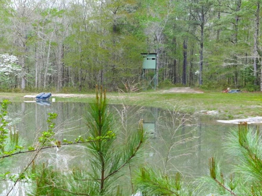 Gorgeous 52 acre farm. 2BR/1B furnished manufactured home with new window air conditioner. Solar powered smaller cabin with propane tank & wall heater. Extensive road system, multiple tree stands/feeders. Abundance of wild life; deer, bobcat, bear and turkey. Majority of property is fenced and has mature loblolly pine plantation and mature hardwoods. Two ponds stocked with bass, brim, & black crappie. Year Built: House 2012, Solar Cabin 2011. Property is 90% wooded. Additional acreage available.