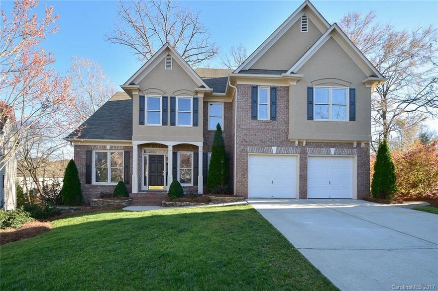 Heart of Ballantyne on a professionally landscaped cul de sac lot w/ inground irrigation. The entire home including the ceiling has been freshly painted. New carpet with new 8 pound padding just installed. No low ceilings in this home even the upstairs has 9ft plus ceilings. Kitchen has solid 42" maple cabinets with breakfast bar & granite countertops. Even the bathrooms have granite countertop with raised vanities too. Backyard backs to trees so enjoy the beauty from the oversized deck.