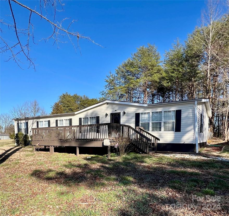 Looking for a home with acreage, large detached garage and fenced in pastured land, then look no further! This beautiful home has laminate flooring throughout main areas and the updated kitchen is every woman's dreams. Huge master bathroom with huge closet. The large detached garage is perfect for multiple cars or that perfect man cave, also has electricity in it. To the right of the home is a huge fenced in area suitable for cows, horses or any other farm animal you might have. Home sits on a dead end street with farm land around so if your looking for peace and quiet this is the home for you! A home like this you won't find everyday so book your showings today before its gone!