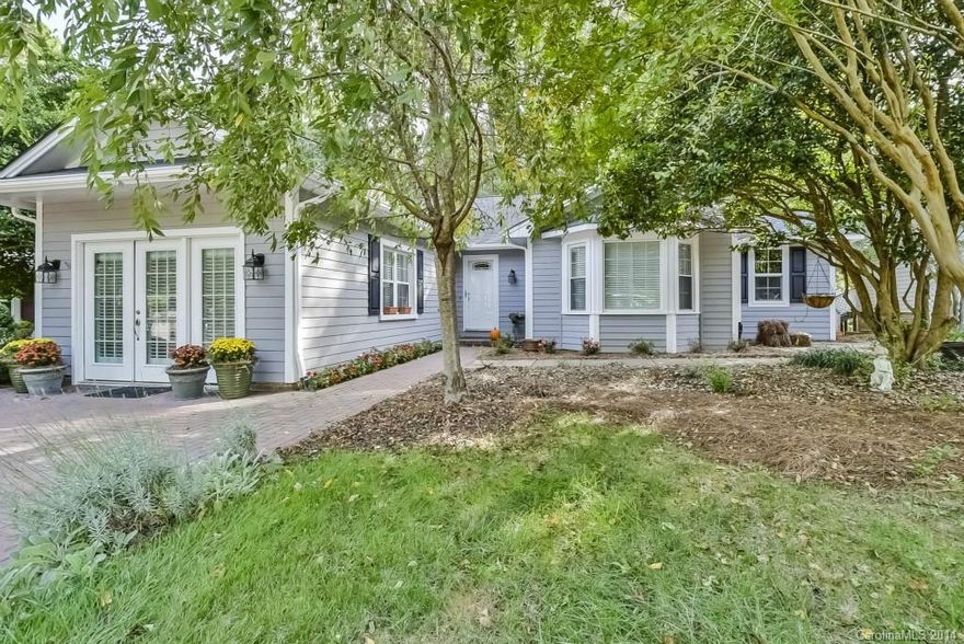 You will love this beautiful patio home in Mulberry Village.  It features 3 bedrooms and 2.5 bathrooms, site finished hardwood floors, completely remodeled kitchen and bathrooms, custom crown molding (home was a former model), beautiful stone fireplace, plantation shutters, and more!  The owners have taken extra care with this home, and it shows.  There is a workshop in the crawl space, and an extra storage shed attached to the home.  You won't be disappointed!