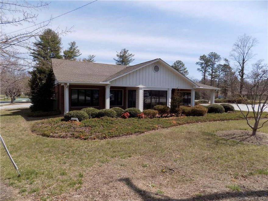 Formerly a First Citizens Bank & NCNB of North Carolina.  Currently a little over 2000sf with a drive up window and 4 drive-thru bays and one drive-thru for an ATM machine. Signalized corner at 1700 Asheville Hwy and E Clairmont Drive., at the entrance to Patton Park. The bank is equipped with a built in concrete vault and a bank vault door. There is a deed restriction from FCB that expires on September 7, 2017 (a few months) from being used as a financial institution. 2 parcels totaling 1.5 ac.