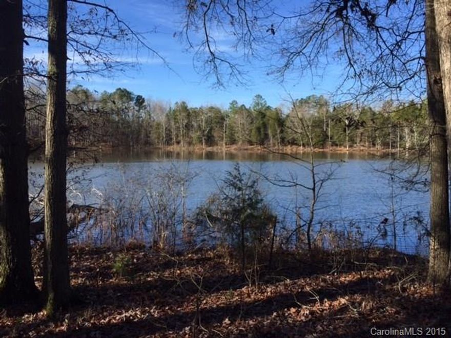 5.83 ACres. Mostly wooded with pond.
Buyer must obtain Well and Septic permits required.
