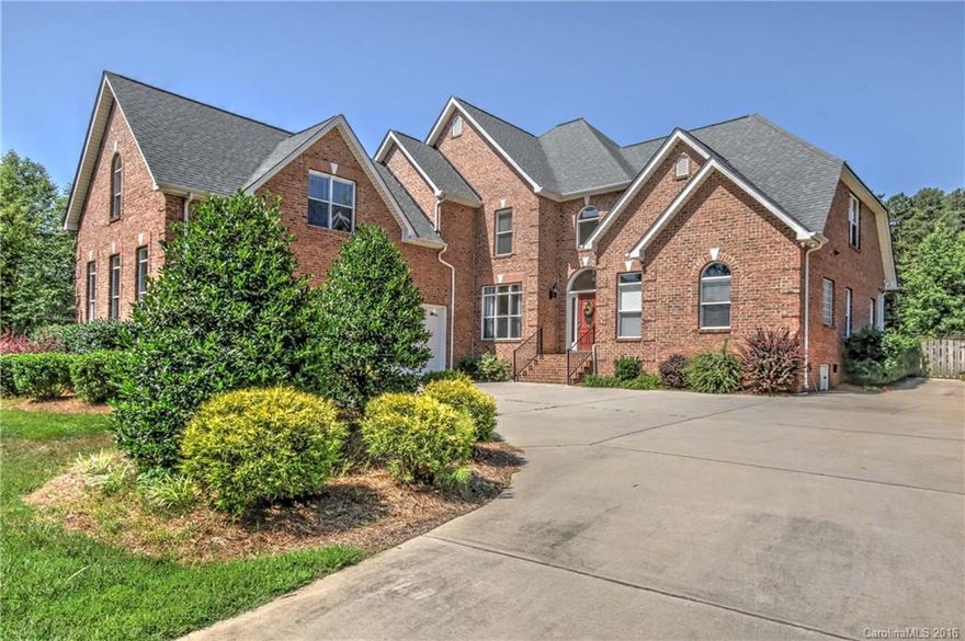 MINUTES TO MOORESVILLE!! Expect to be impressed Waterview custom built all brick home on beautiful 1.23 acre lot! Flowing floorplan w/ hardwoods on main. Spacious gourmet kitchen, den, great room & wonderful Master retreat on main, large media room w/ 110" projection TV! Great home for entertaining! Covered porch overlooks designer inground pool (new liner) with serene waterfall, large paver patio, professionally landscaped. Amazing outdoor living! Minutes to new Hwy 16 or 77 and boat slips.