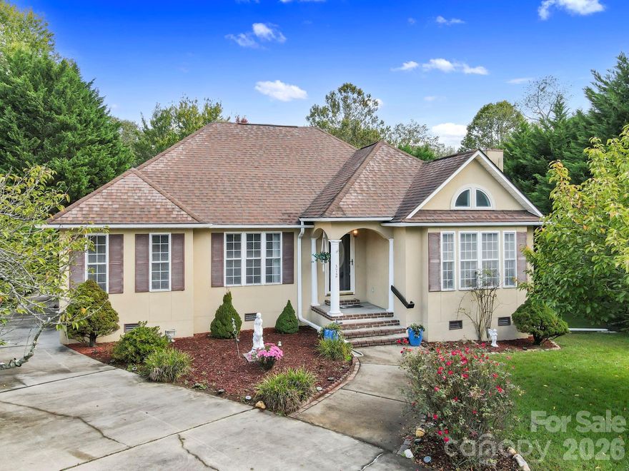 Nestled in the heart of the desirable Mills River community, this beautiful home combines serene natural surroundings with modern comfort and convenience. Set on a private lot with mature landscaping, this property offers the perfect balance of peaceful mountain living and easy access to Hendersonville, Asheville, and Brevard.
A picturesque creek gently flows through the property, creating a soothing natural backdrop and adding to the home’s undeniable charm. Whether you’re enjoying morning coffee on the porch or hosting friends outdoors, the tranquil sound of running water makes every moment feel like a retreat.
Step inside to a bright, open floor plan designed for effortless entertaining and everyday living. The spacious living area features abundant natural light, cozy gathering spaces, and seamless flow into the dining area and well-appointed kitchen. Whether you’re hosting friends or enjoying a quiet evening at home, this layout feels both inviting and functional.
The primary suite provides a relaxing retreat with a generous walk-in closet and en-suite bath. Additional bedrooms offer flexibility for guests, a home office, or hobbies. Outdoor living shines with a covered porch, patio, and plenty of room to enjoy the fresh mountain air.
Located just minutes from the Ecusta Trail, local breweries, and the Asheville Regional Airport, this home makes it easy to enjoy the best of WNC living.