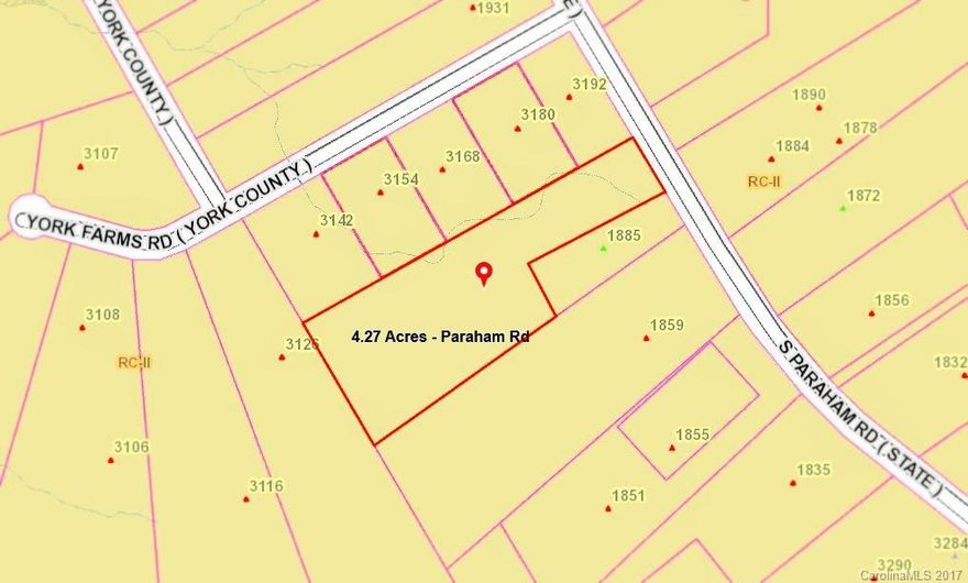 Room to spread out on over 4 acres located on the Hwy 49 side of Paraham Road, convenient to Lake Wylie and Charlotte, Clover Schools.