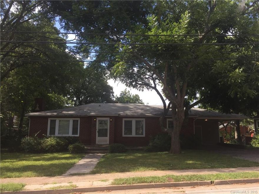 Close to Central Avenue and I-74, this cute ranch is in great location with established trees and greenery. Three bedrooms and 2 full baths with a large living room, family room with a wood burning fireplace, dining room and large kitchen.  There is a carport for parking.