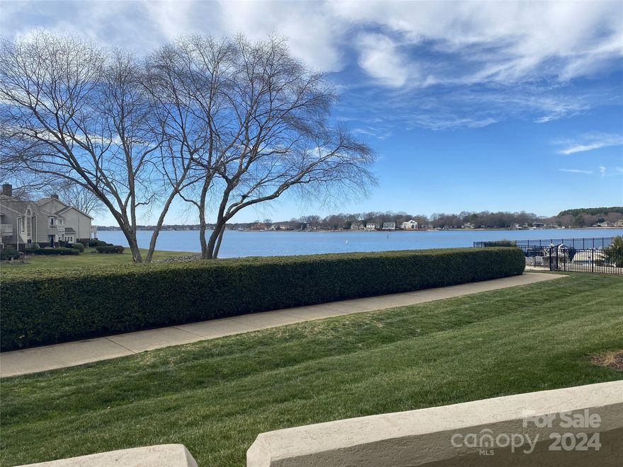 STUNNING 1ST FLOOR WATERFRONT CONDO LOCATED IN THE MOORINGS OF VINEYARD POINT- RENOVATED 3 BEDROOM 2 FULL BATHS- GORGEOUS WATERFRONT POOL AND BOARDWALK- COVERED MAIN LEVEL PATIO- KITCHEN HAS OVERSIZED SIT AT BAR FOR ENTERTAINING- HERRING BONE DESIGN BACKSPLASH- STAINLESS APPLIANCES- REFRIGERATOR, WASHER, DRYER TO REMAIN WITH PROPERTY- BUILT IN BEVERAGE STATION WITH SEPARATE ICE MACHINE- OPEN FLOOR PLAN WITH FIREPLACE- OWNERS SUITE HAS BEAUTIFUL VIEWS OF THE WATER- RENOVATED OWNERS BATH HAS CURBLESS ENTRY SHOWER FEATURING MULTIPLE SHOWER HEADS/JETS AND BUILT IN SEATING- DOUBLE SINK VANITY WITH LED BACKLIT MIRROR- GUEST BEDROOM INCLUDES BUILT IN MURPHY BED- ENJOY YOUR SUMMER TIME ON THE WATERFRONT PATIO! THIS IS A MUST SEE! BOATSLIPS MAY BE AVAILABLE TO LEASE-