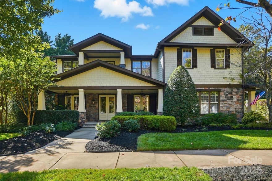 Tucked away on a peaceful cul-de-sac in the heart of Baxter Village, this incredible custom-built home seamlessly blends luxury, comfort, and craftsmanship in every detail. From the moment you arrive, you’ll feel the difference, thoughtful design, timeless finishes, and exceptional functionality set this home apart. Step inside to discover custom details throughout, from rich millwork and stone accents to elegant brick features and high-end finishes. The open-concept living spaces flow effortlessly, creating an inviting setting for both everyday living and effortless entertaining. The primary suite is a true retreat, showcasing gorgeous wood beams, a private screened porch, and a stunning built-in sauna, the perfect sanctuary for relaxation. Outdoors, your private backyard oasis awaits. A heated saltwater pool and spa are surrounded by lush landscaping and tranquil wooded views, with direct access to Baxter’s scenic trail system offering miles of paths just beyond your back gate. Entertain in style in your very own pub, an ideal spot for game days, gatherings, or quiet evenings at home. Additional highlights include a 4-car garage, finished storage areas, and thoughtful custom touches on every level. Perfectly positioned within Baxter Village, you’ll enjoy easy access to parks, trails, shops, dining, and top-rated Fort Mill schools, all within one of the area’s most sought-after communities. Welcome home to 2424 Commons Court, where luxury living meets small-town charm.