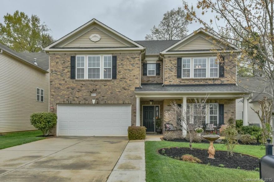 Tons of space for the money! Stunning home in highly sought after Ft Mill School District. Meticulously maintained & upgraded this home features hardwood floors, updated lighting & fans throughout, huge bonus room/loft. Kitchen has 42" cabinets, island, Corian counters, tile backsplash, SS appliances, gas range w/ double oven & enormous walk-in pantry. Outside has in-ground irrigation, large stone patio w/ in-ground gas line, & backs to wooded area. Oversized garage w/ workshop area & storage.