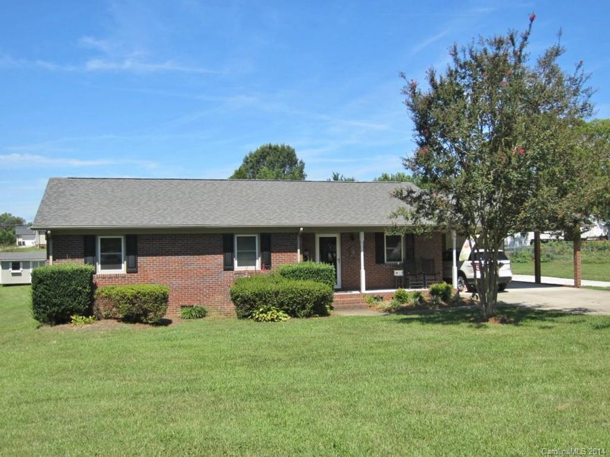 Rare brick ranch on a level .65 acre lot featuring an attached 2-car carport PLUS a detached 2-bay garage with plenty of work space.  Add in the storage building & extra driveway space, and you have a car enthusiast's dream! Inside this well-maintained home, the kitchen has been handsomely updated w/granite counters & stainless steel appliances. Also updated in the last 5-6 yrs: replacement windows, new HVAC & new roof. Finally, the screened porch is a peaceful place to relax after a long day.