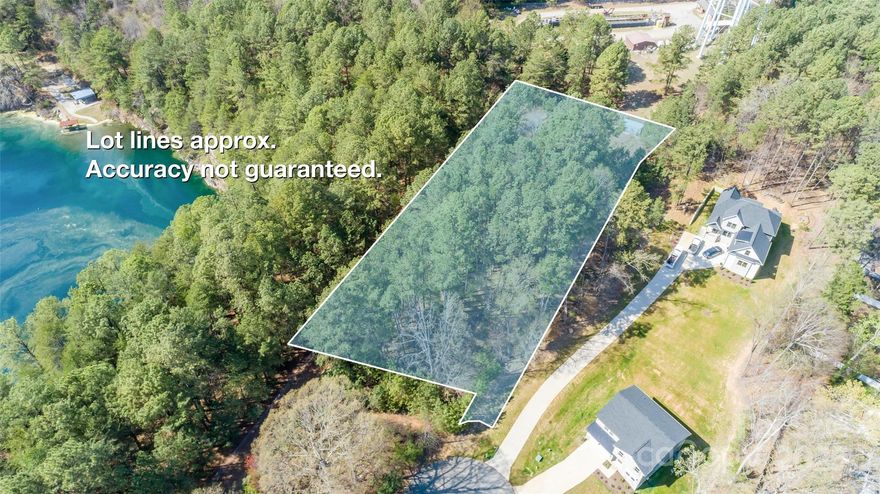 Explore the potential of this gently sloping lot in Mooresville, situated on a quiet cul-de-sac just minutes from Lake Norman. Conveniently located near shopping, dining, and other amenities, the property has utilities already in place. Whether you’re looking to build a personal retreat or invest in a desirable neighborhood, this lot offers a straightforward path to creating your own space in the Lake Norman area.