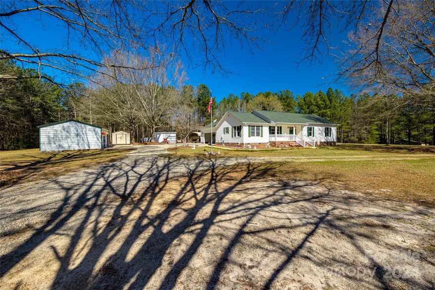 Don't miss out on this incredible opportunity! Take hold of the chance to own this delightful 3-bedroom, 2-bathroom home situated on approx. 1.85 acres in Lancaster, SC. Boasting generous space and abundant potential, it presents the ideal canvas for crafting your dream space. This property also features a 20x25 2-bay shop, a 10x12 shed, a 16x12 shed with a 10-foot lean-to, and a detached carport. Call now to schedule your showing!