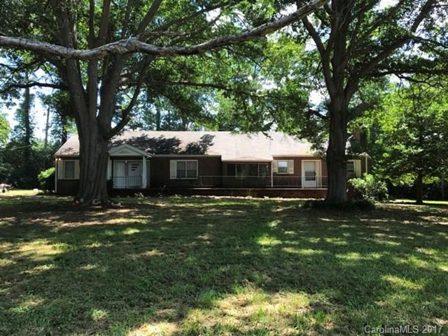 Home needs TLC.  Can be a second living quarters with 2 kitchens.  Some fencing for pasture.  Sold "as is"
