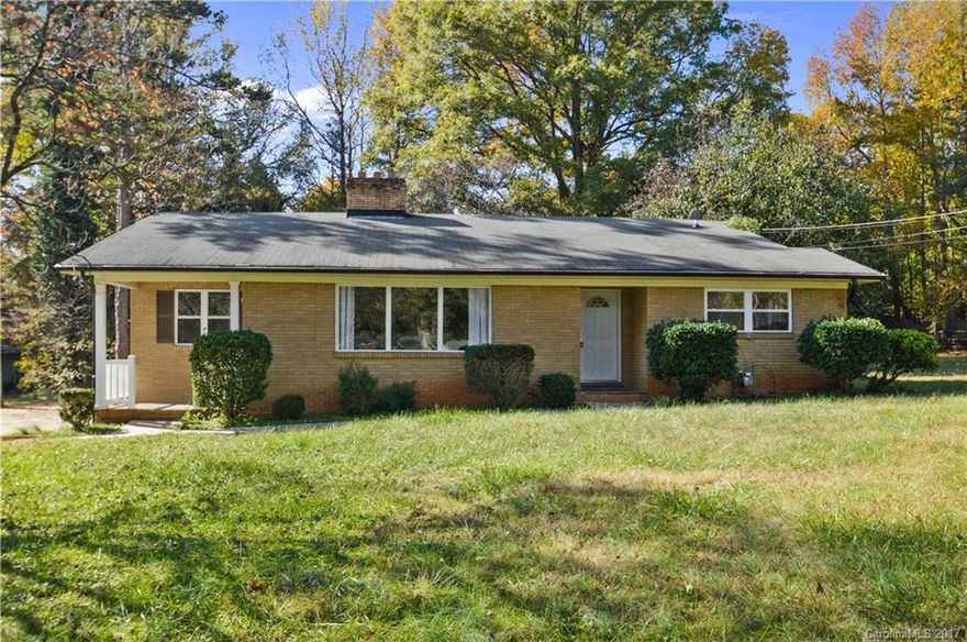 MOVE IN READY with Appliances! Brick Ranch in established neighborhood mature trees. Spacious rooms updated  new carpet & paint. Large updated kitchen,  Laundry room. Unfinished basement 3bedroom 2 full bath Great room, with beautiful fireplace.  Living room or study. Modern and Fresh new look.   Huge workshop/hobby area in back with working stone fireplace wired.    Plenty of parking for boats/RV's.  Nice big level yard.  Beautiful home in central location Close to Uptown and University area.