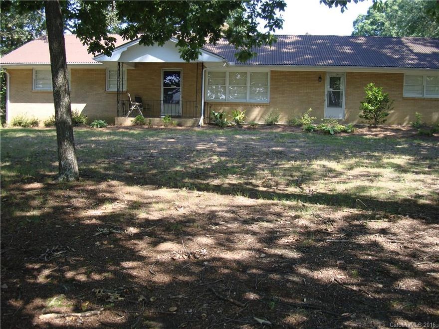 This up-dated house sits on top of a hill near Dallas & Costner School. Full basement with finished bedroom and bath in basement, fenced area in back with large barn, great for horses, animals. Inside has newer bamboo floors in great room, kitchen, dining room and hall. Newer heat pump, & paint inside, large patio off basement great for cook outs, BIG oak trees everywhere, kitchen upgrades include new dishwasher. 24 hour notice for ALL showing.