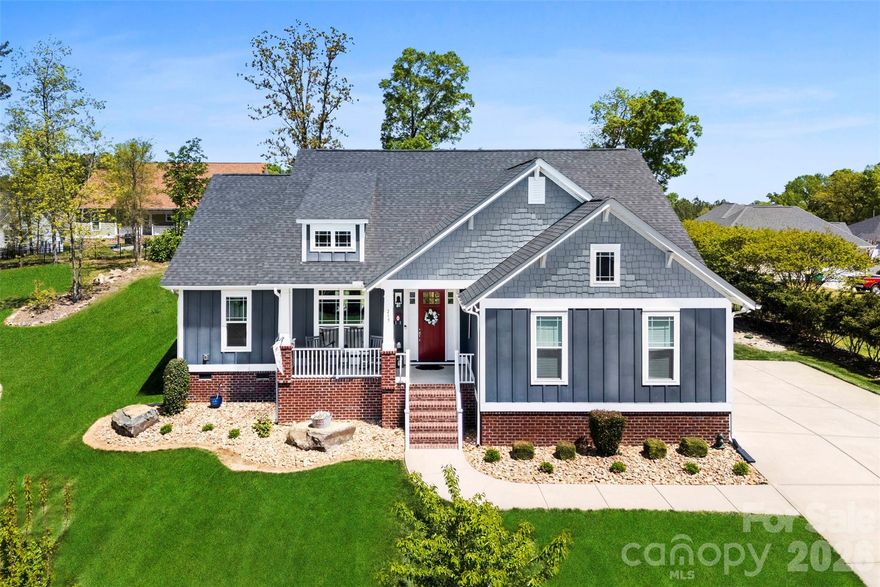 This custom-built, SELLER-THOUGHT-OF-EVERYTHING home is waiting to meet you! In addition to a stylish fiber cement exterior, open floorplan, spa-like Primary suite, split bedrooms for privacy, well-sized rooms, spacious closets, ceiling fans, LVP flooring, Sherwin Williams monochromatic paint throughout, extensive trim & crown molding, tray ceilings, recessed/pendant/rope lighting, an abundance of storage, 2-car garage and extended driveway, cozy front porch, covered rear porch with extended patio, there's ALSO a charming rocking chair front porch, Craftsman exterior door with sidelites and transoms, custom cordless cellular shades, upgraded raised-texture interior doors, drop zone with storage shelves, Laundry Room with gas dryer hookup/folding table/extra storage, Rinnai tankless gas water heater, covered back porch with separate patio, permanent gas grill line, and KITCHEN UPGRADES GALORE--gas range, ss farmhouse sink, soft-close drawers, corner lazy susan, pull out spice drawer, window over sink, 2-tone island/cabinetry, hidden trash receptacles, and walk-in pantry! Have I piqued your interest?? Come take a look! And check out the adorable downtown that's less than a mile away.  https://oakboro.gov/  You might fall in love!