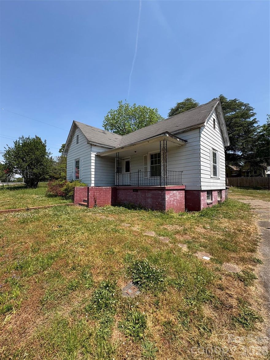 Investor special in the heart of Mocksville! This 2-bedroom, 1-bath home offers approximately 1,148 square feet and sits on a 0.26-acre corner lot with city water and sewer already in place. Full of potential, this property is ready for renovation and would make a great fix-and-flip, rental investment, or restoration project. Conveniently located near downtown Mocksville, shopping, dining, and local amenities. Property is being sold as-is. No appliances convey. Bring your vision and turn this opportunity into something special!