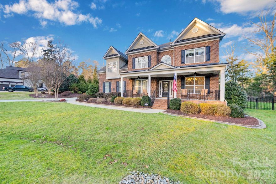 Welcome to 6756 Montgomery Road! This spacious 5-bedroom, 4.5-bath home is located in the highly desirable Heron Cove neighborhood of Lake Wylie, SC. Featuring beautiful hardwood floors and a recently updated kitchen, this home offers both style and functionality.

As you step through the front door, you’re greeted by soaring ceilings, a private home office, and a stunning dining area complete with a separate bar space that flows seamlessly into the living room. The warm and inviting open kitchen overlooks the living area, creating the perfect layout for entertaining while still offering comfortable everyday living.

The main level also features a second primary suite, making it an ideal guest retreat.

Upstairs, the thoughtfully designed layout is perfect for families. On one side, you’ll find the primary bedroom and bathroom with three spacious walk-in closets. On the other side, there are 3 additional bedrooms, two full bathrooms, and a bonus room — perfect for movie nights or the playroom of your dreams.

Step outside to enjoy the spacious covered porch and beautifully hardscaped patio with a fire pit. The fully fenced backyard, paired with lush landscaping, provides both privacy and a peaceful outdoor setting.

Heron Cove offers wonderful amenities including a neighborhood pool, kayak launch, and walking trails. Come see this beautiful home and discover all that the home and community have to offer!