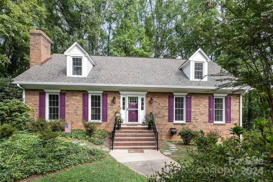 Charming 1.5 story cottage home that has been meticulously maintained! The full brick exterior & plantation shutters throughout add to the home’s timeless appeal, while recent updates like some new light fixtures, ceiling fans, & fresh paint create a bright & welcoming atmosphere. The main floor features the primary bedroom with a newly converted full bath, as well as a second flex bedroom & an updated full bath across the hall. Kitchen includes new appliances, countertops, backsplash, sink, & faucet. Enjoy the cozy living room with an updated gas fireplace & new mantel, or unwind in the insulated porch that leads to an outdoor balcony w/ new railings and Trex floors. Upstairs, you'll find two bedrooms with storage space and an updated full bathroom. The finished basement offers versatile living space, including a large storage area. Step onto the covered patio to enjoy the private, wooded backyard. New upper HVAC unit 2024. Don't miss the opportunity to view this stunning home!