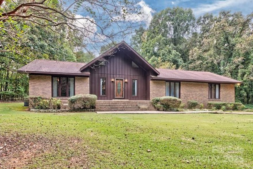 This lovely 3 bedr/2 bath home is in the BUFORD COMMUNITY area of Lanc. County, about 1/2 mile from Buford High School.  Home sits on 5.69 acres, which can be divided, & includes an inground swimming pool w. pool house, & a wired shop/man-cave on the grounds.  Home sits back off the road for privacy and features an attached  double garage on the 'side' which works remotely.  Home has not been updated in years & needs TLC in that area. There's a  fireplace wired for propane gas logs. in the huge LR. The back door, off the den, leads to the back yard where a beautiful inground, covered pool, is located.  The pool, pool house, and social area is enclosed w/ cyclone fencing.  A door out of one of the bedr. also leads to this beautiful area. The lining in the pool was installed & used 2 seasons before putting the new cover over the pool & hasn't been used since.   Outside & beyond the pool fencing is the workshop/mancave. It's large, roomy, & will hold two vehicles w/ room to spare. This home has approx. 679 ft of road frontage.  The home w/ TLC & the Buford area can't be beat in Lancaster Co.  Call me or your agent for a private tour!  I think you'll like this one!